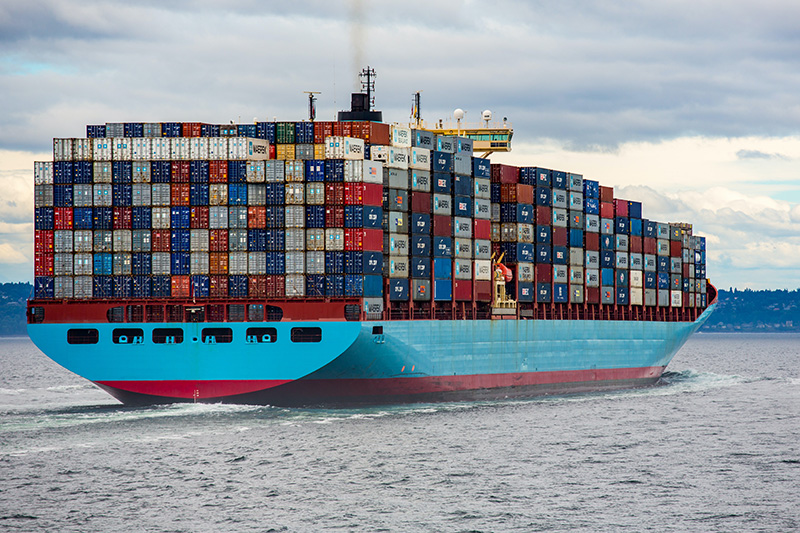 Huge cargo ship with hundreds of containers